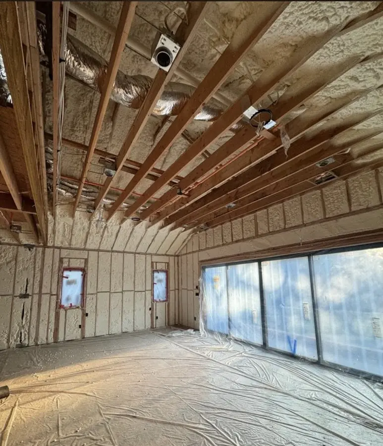 Interior walls and ceiling insulated with spray foam during new construction in Fort Knox